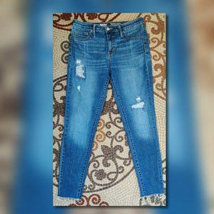 Distressed High Rise Jegging